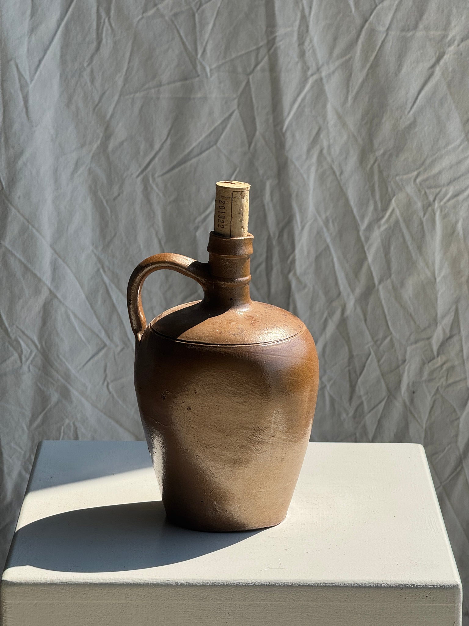 Jarre brune vernissée à anse H23,5