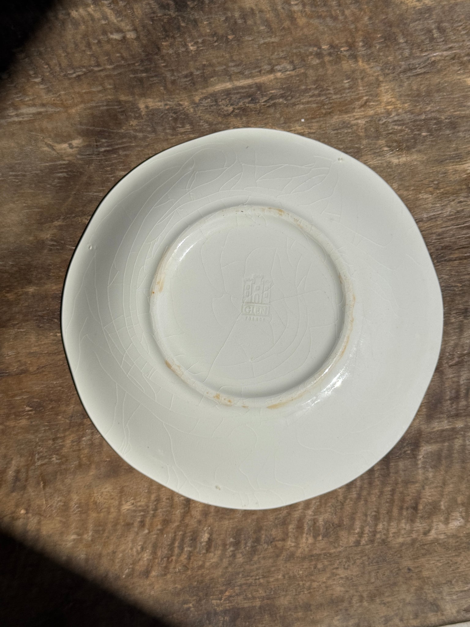 Petite assiette creuse faïence de Gien à motif de paysage bleu D21,5