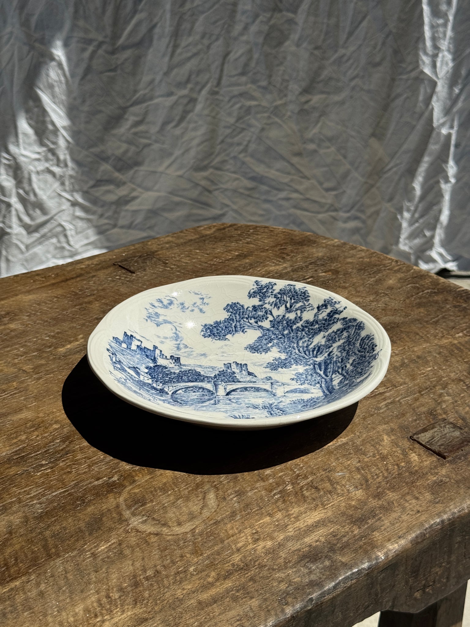 Petite assiette creuse faïence de Gien à motif de paysage bleu D21,5