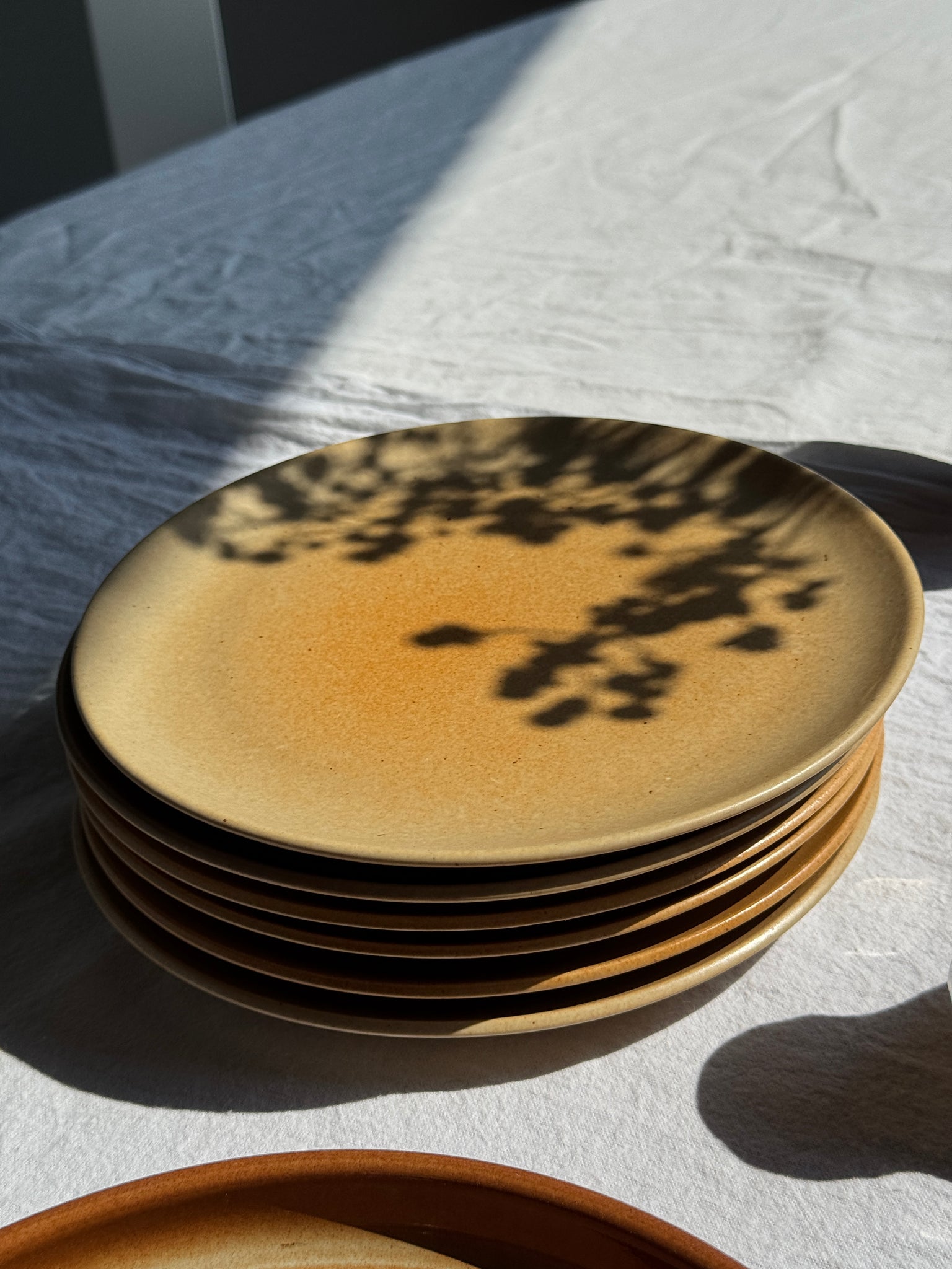 Lot de 7 assiettes à dessert en grès orange vintage D20