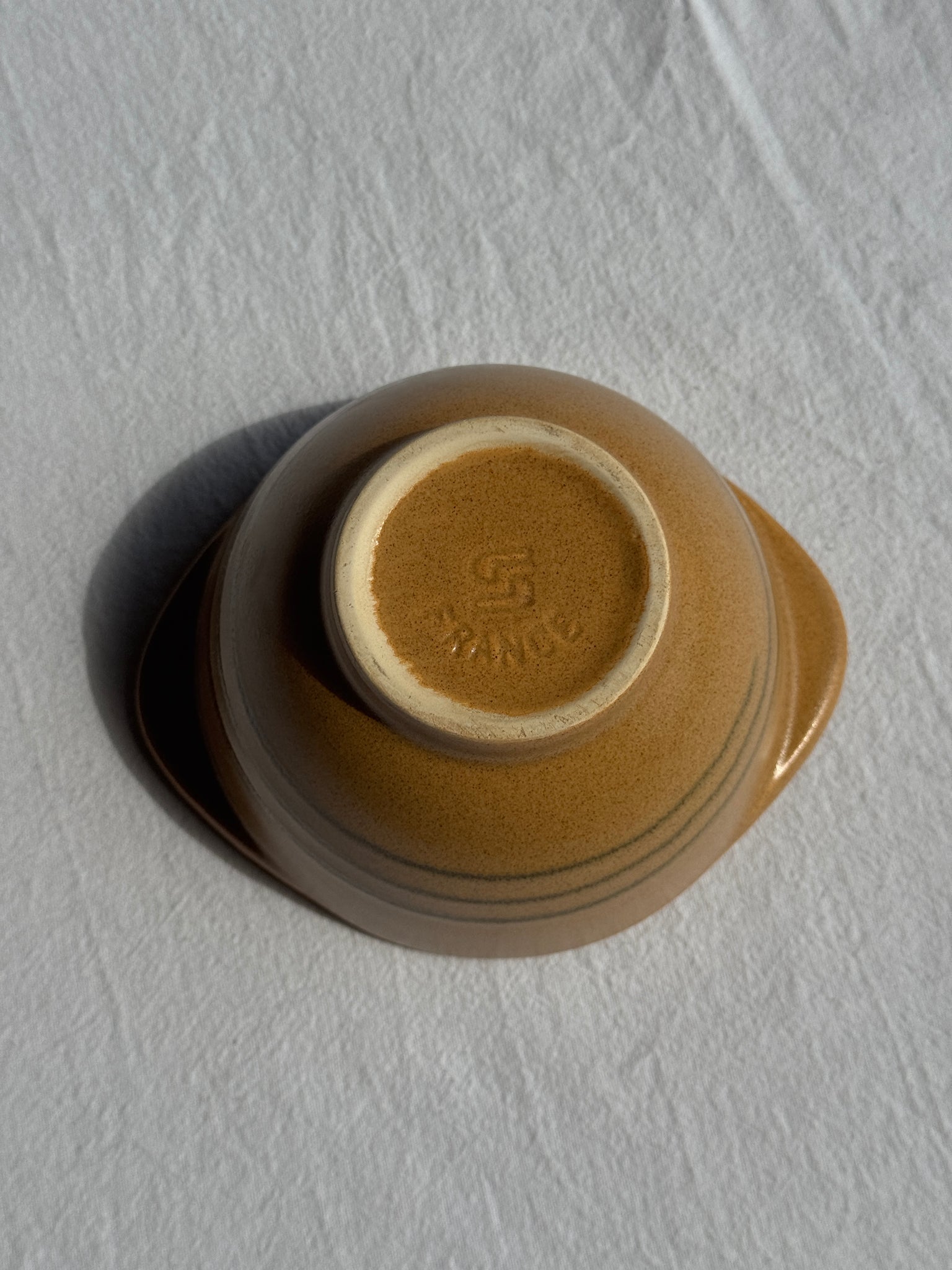 Un petit bol à 2 anses stries Sarreguemines D12,5