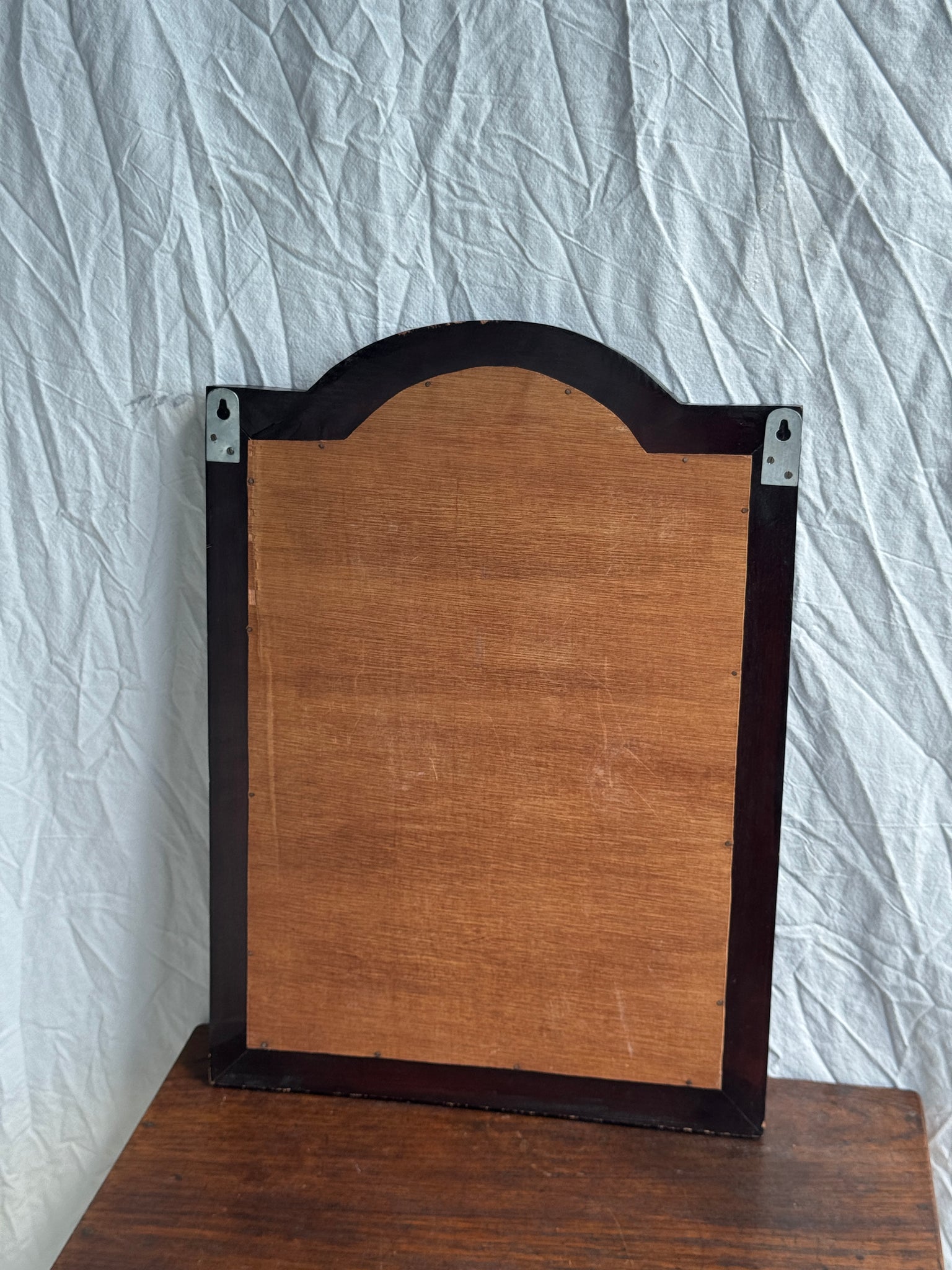 Miroir en bois brun foncé à deux battants baguettes H55 L40
