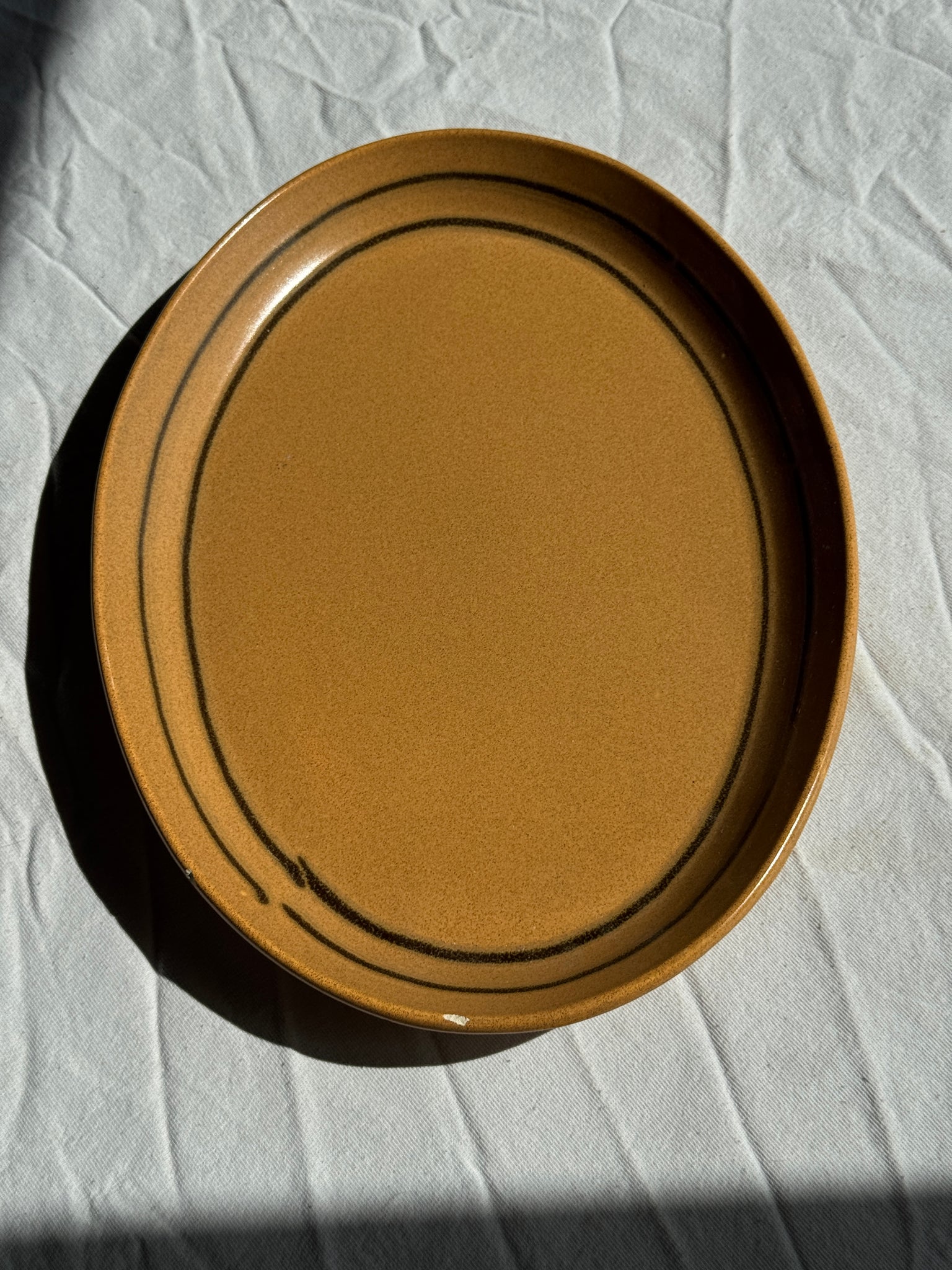 Grand plat ovale en grès Sarreguemines liseré brun 27x37
