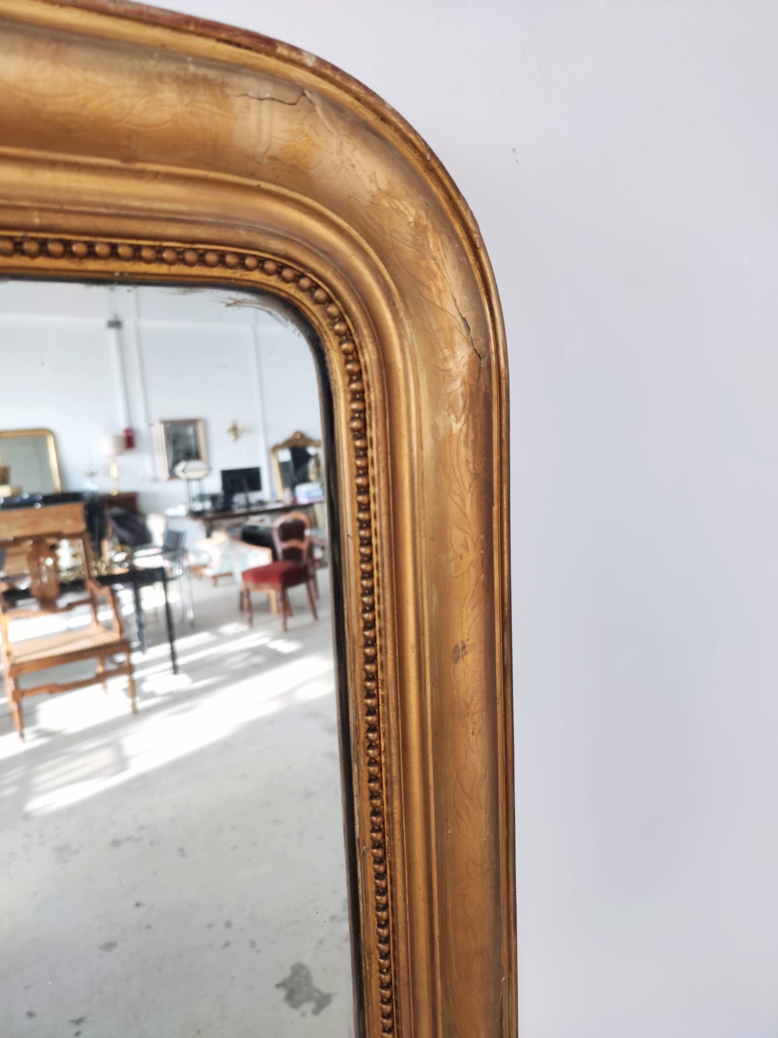 Ancien miroir de cheminée de style Louis Philippe double glace au mercure cadre redoré XIXème H: 1m48