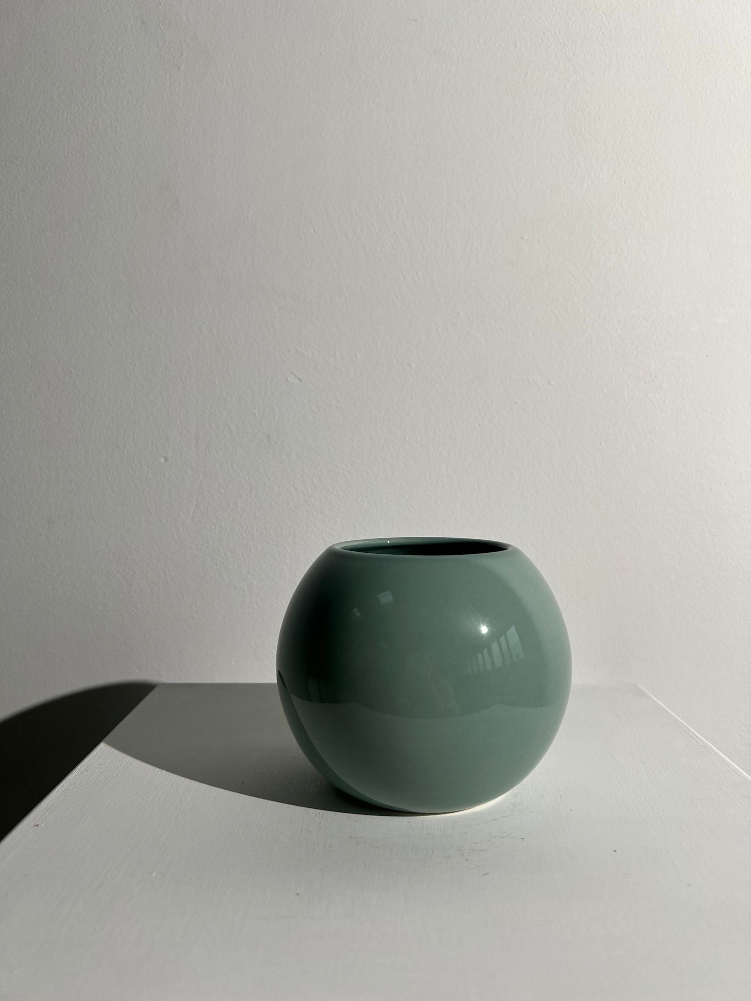 Petit vase boule bleu clair/turquoise