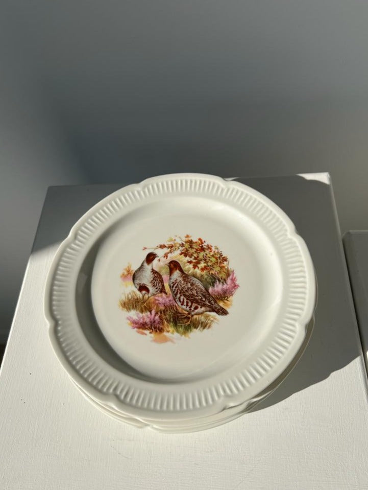 Lot de 4 petites assiettes en porcelaine de Vierzon à décor d'animaux
